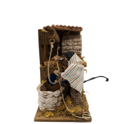 Presepe In Movimento Donna Al Pozzo