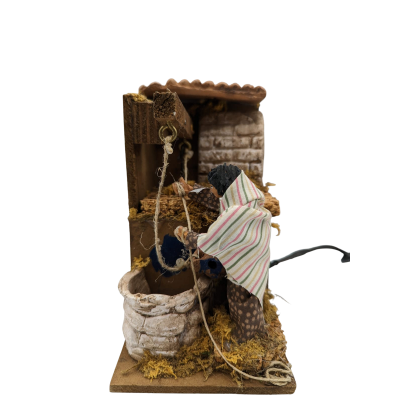 Presepe In Movimento Donna Al Pozzo