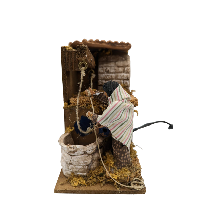 Presepe In Movimento Donna Al Pozzo